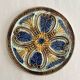Art Nouveau earthenware bottle coaster/trivet, late 19th/early 20th century