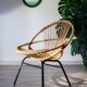 Fauteuil corbeille en rotin et acier, année 70
