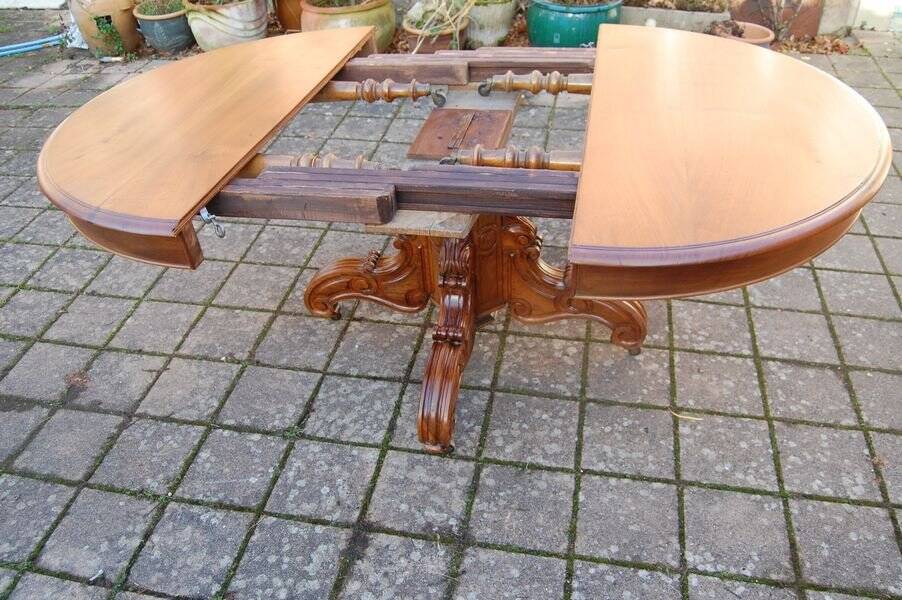 Napoleon III walnut table with central leg and 3 extensions, 14 place settings, late 19th century