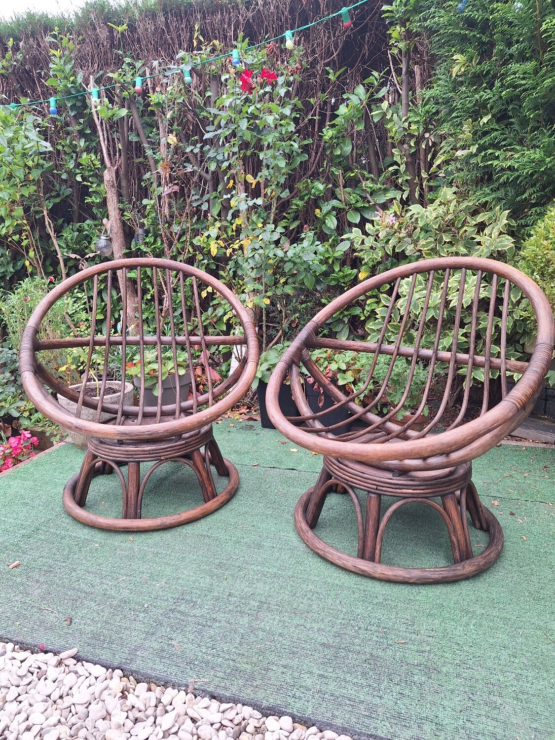Pair of vintage rattan swivel armchairs