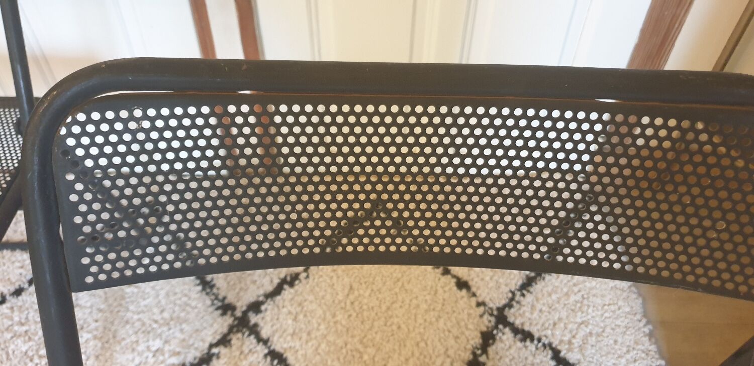 Pair of folding chairs in perforated metal