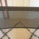 Pair of folding chairs in perforated metal