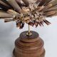 Antique sea urchin pencil on turned wooden base, 22 cm