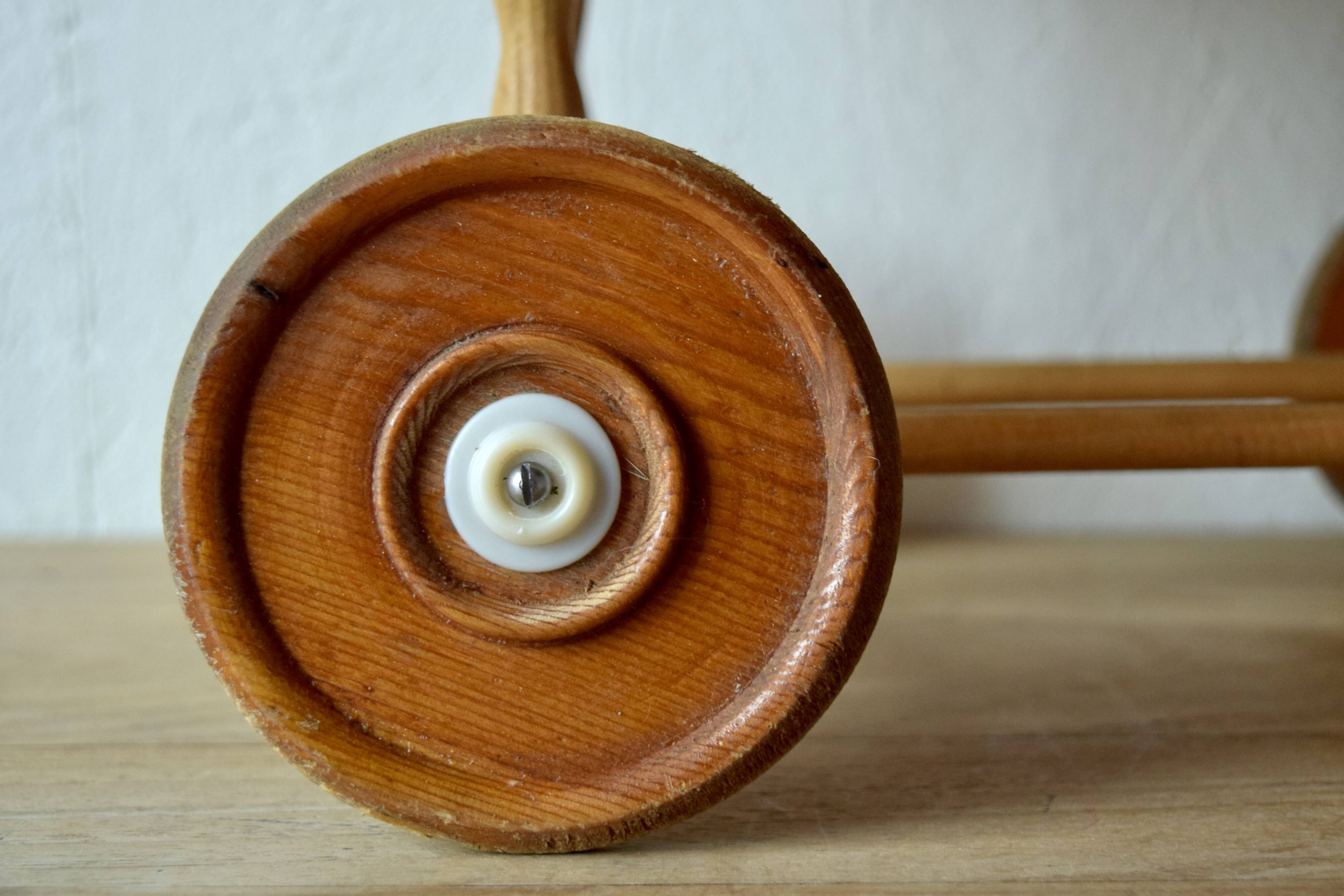 Old dolls pram - wooden wheels