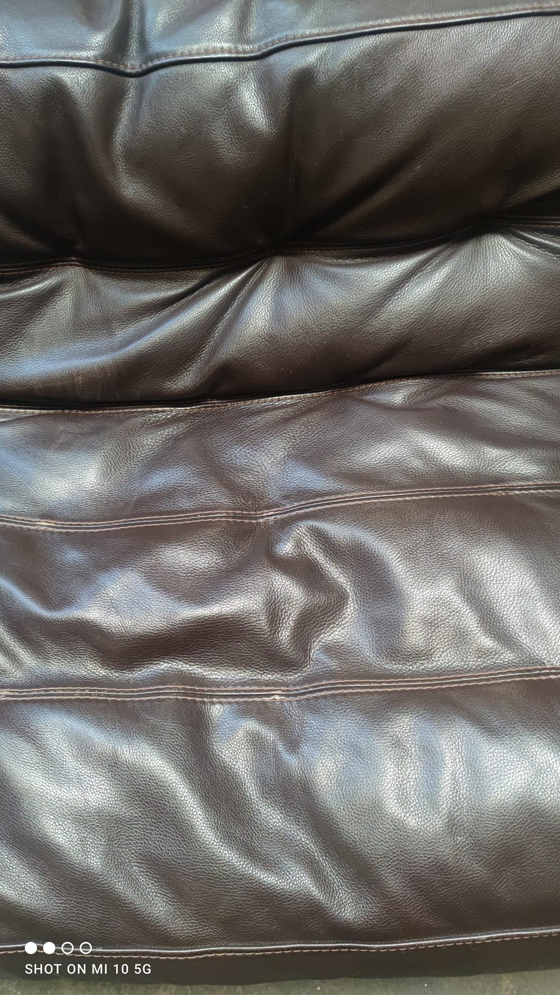 Four-seater sofa in dark brown leather from Steiner by designer Pascal Daveluy, model