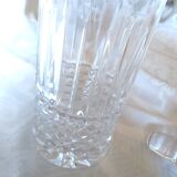 Small round carafe in highly worked cut crystal with stopper