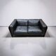 Two-seater sofa in black leather, designed by Tito Agnoli for Poltrona Frau, Italy, 1980s
