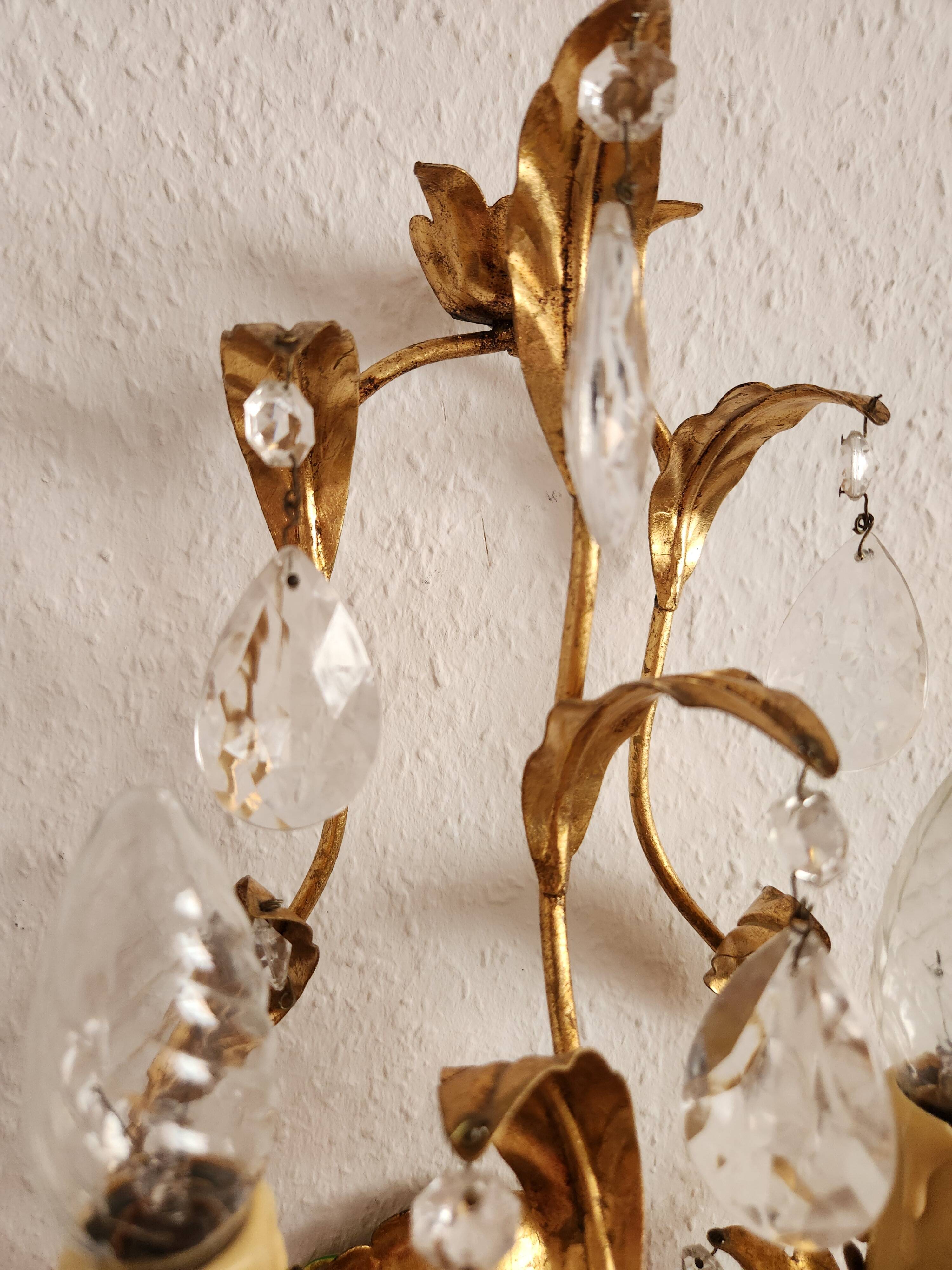 Hand-forged wall lamp gilded with gold leaf and crystals, Italy