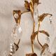 Hand-forged wall lamp gilded with gold leaf and crystals, Italy