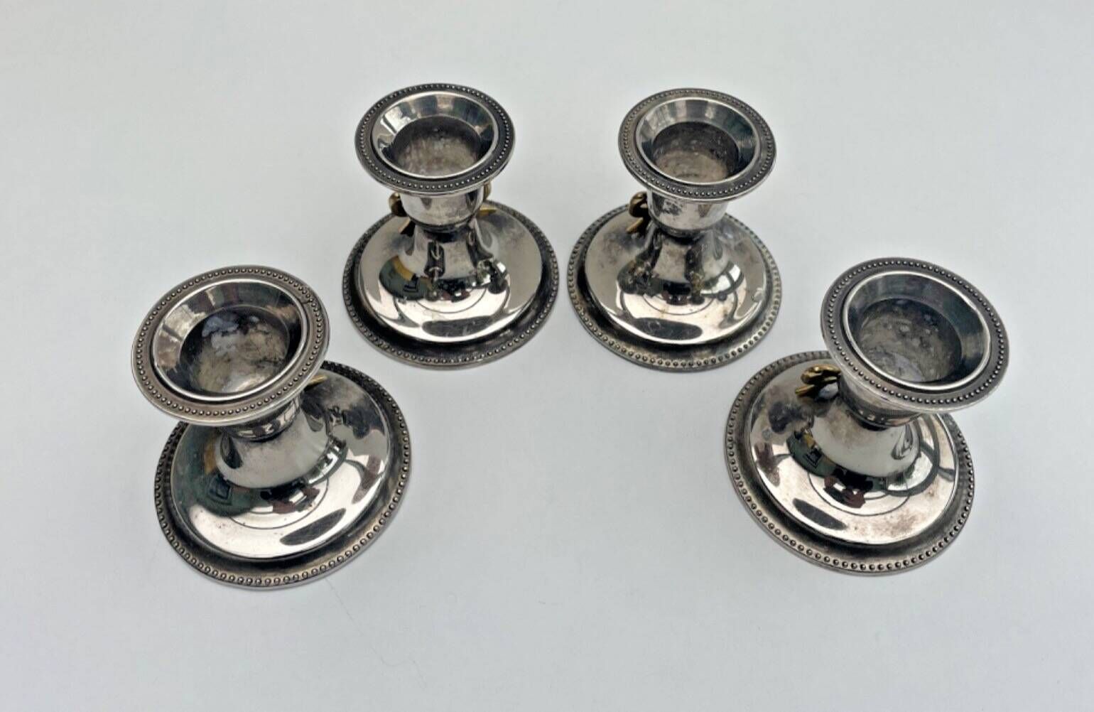 Set of 4 silver metal candle holders with gold bow - classic chic style