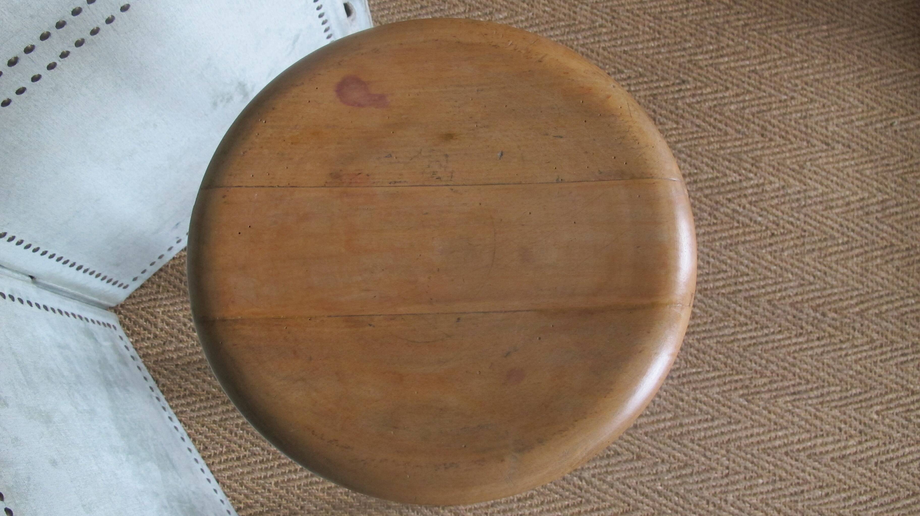 high factory stool made of wood and metal