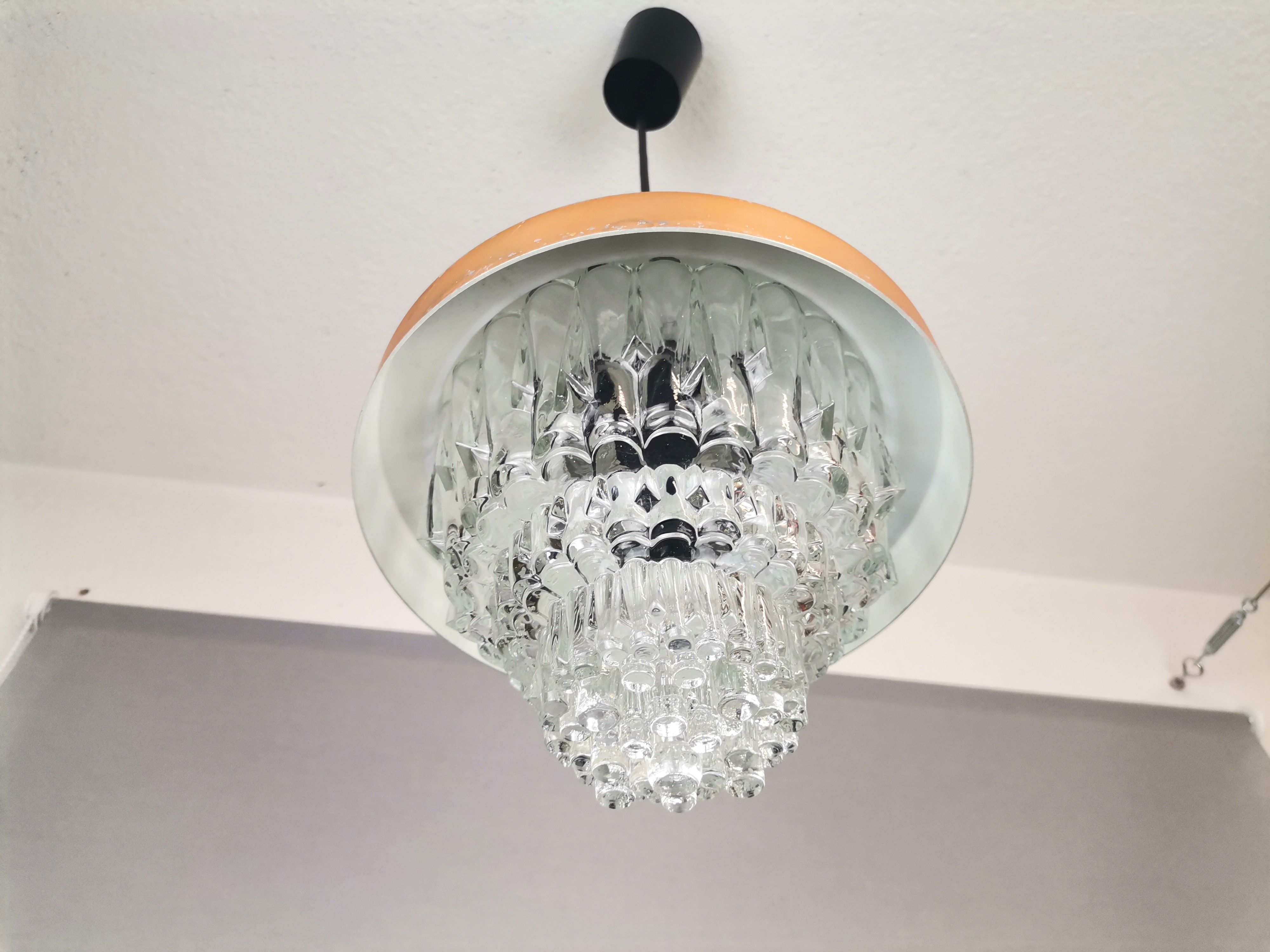 MidCentury Modern clear glass and copper colored aluminium hanging lamp, 1960s