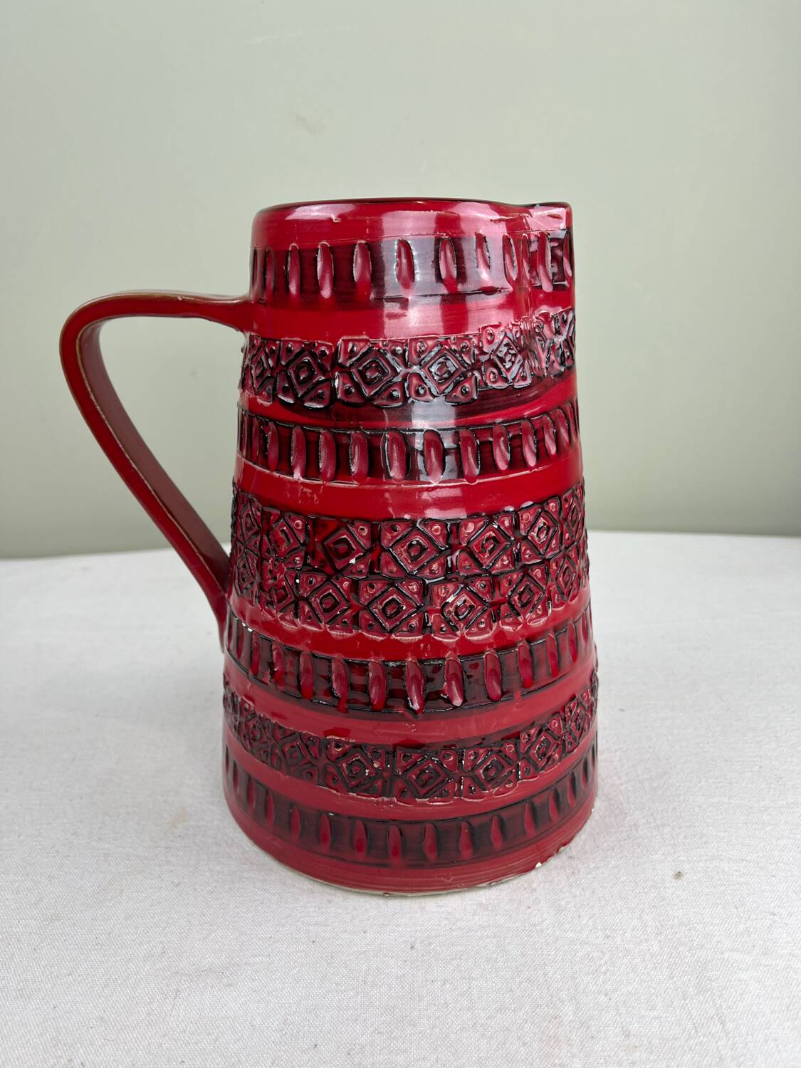 Vintage red ceramic jug