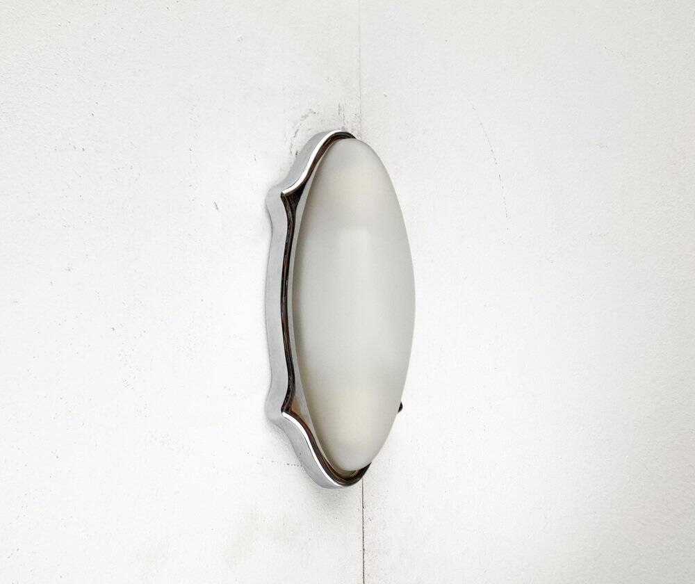 Postmodern Italian wall lamp for indoor and outdoor use, Geco 1 by Luciano Pagani and Angelo Perversi for Arteluce, 1990s.