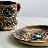 Tasse à café et soucoupe en céramique rustique
