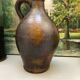 Pitcher in glazed earth in chocolate tones