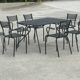 Set of 6 armchairs and perforated metal table from the 1950s.
