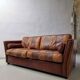 Vintage striped brown orange leather sofa (210 cm x 88 cm)