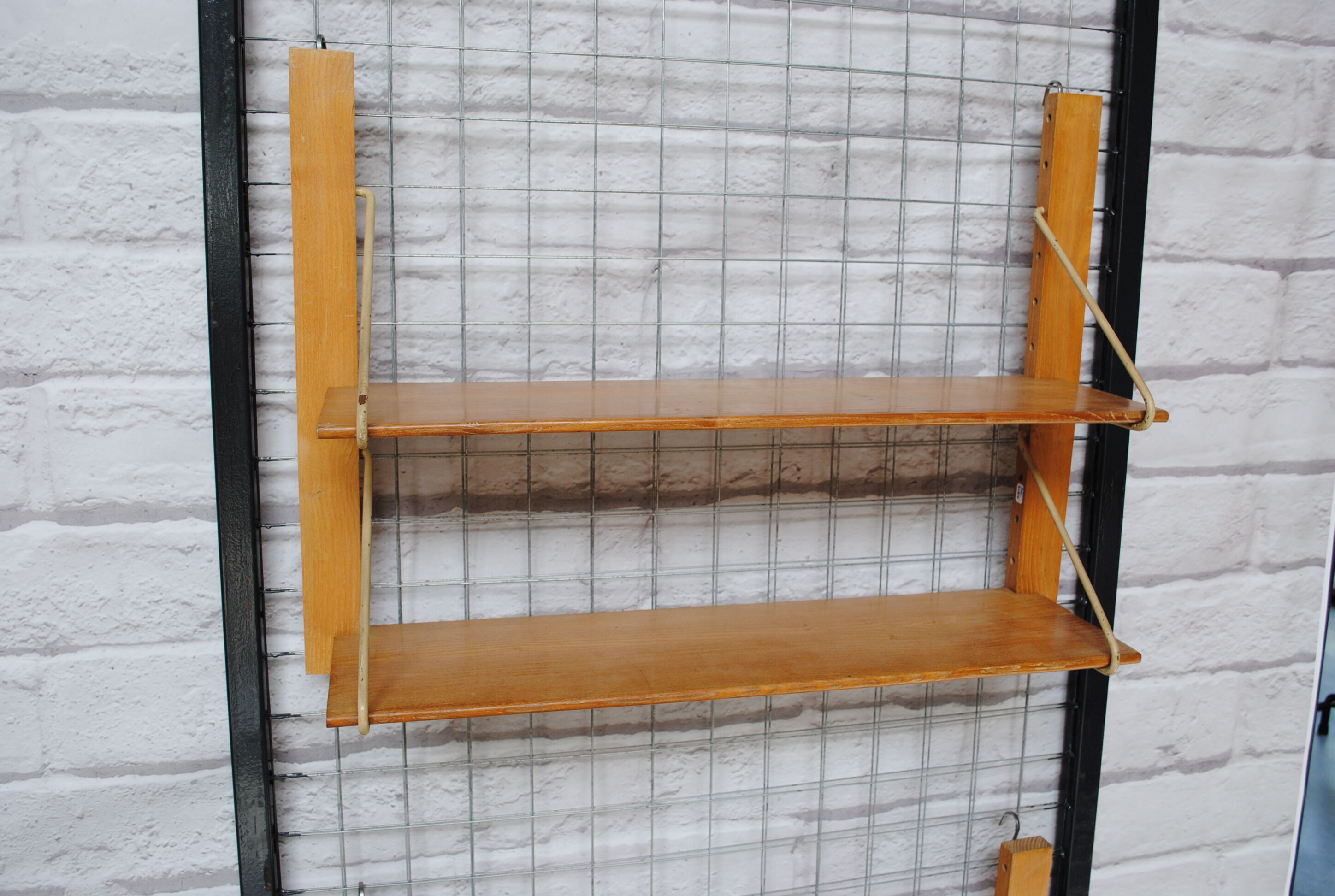 Wooden and metal wall shelf