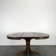 Round teak table with extension