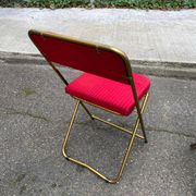 2 folding opera chairs Lafuma France 1970 in gold and burgundy.
