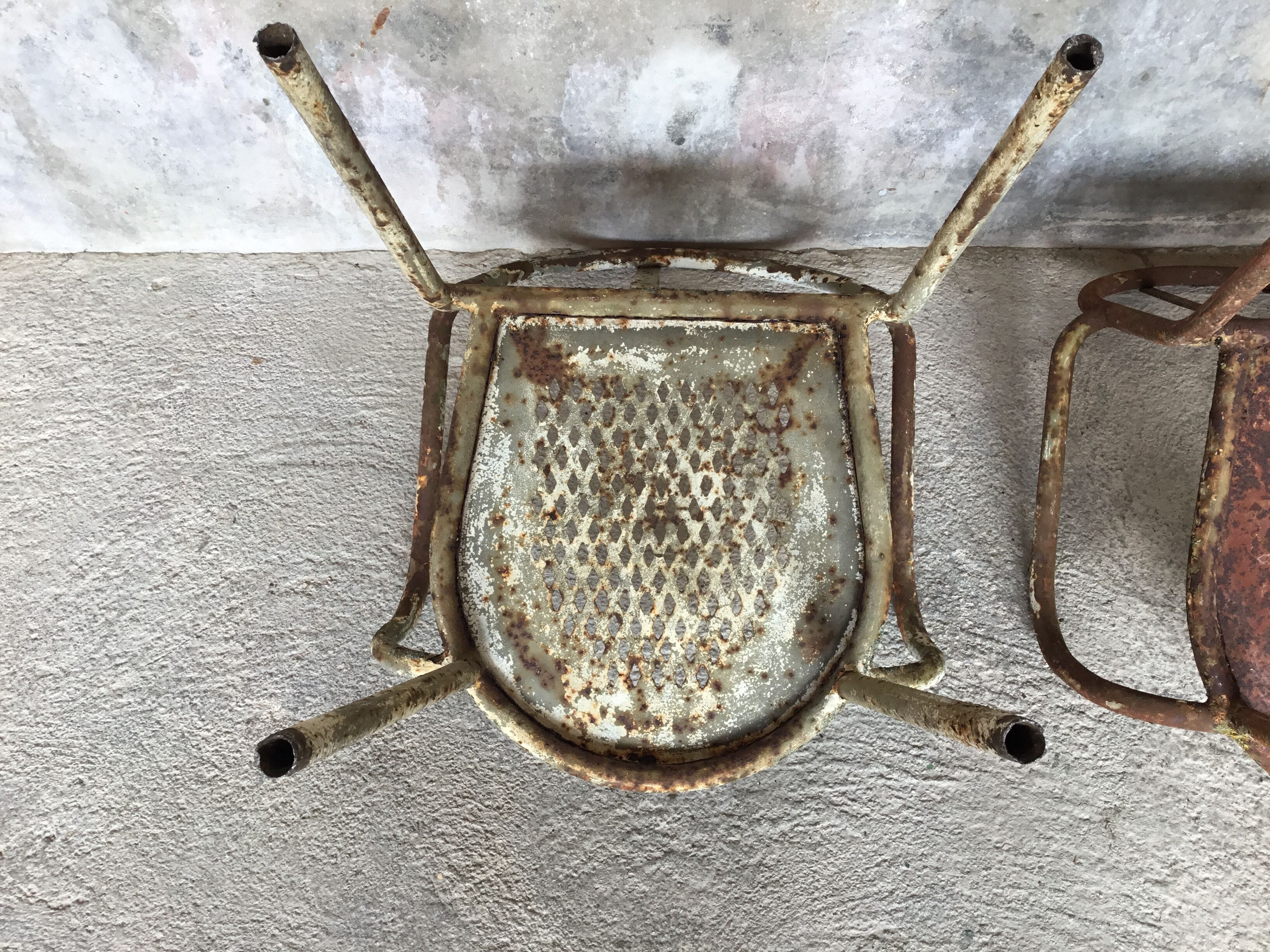 Pair of metal armchairs