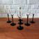 7 Luminarc Domino flutes, black opal tempered vintage glass.