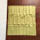 Old embroidered green square table napkin with cutwork