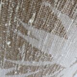 Vintage lampshade with palm leaf pattern.