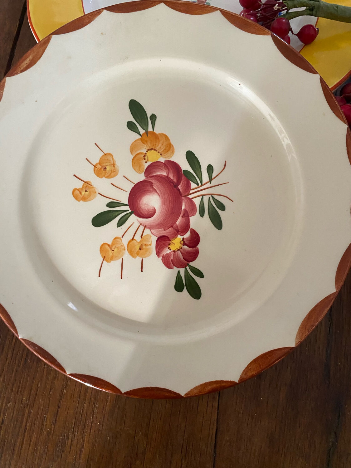 Flowered stamped dessert plates and matching ones.