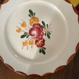 Flowered stamped dessert plates and matching ones.