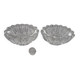 Antique crystal salt and pepper shakers, with their small spoon