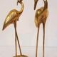 Pair of herons in brass
