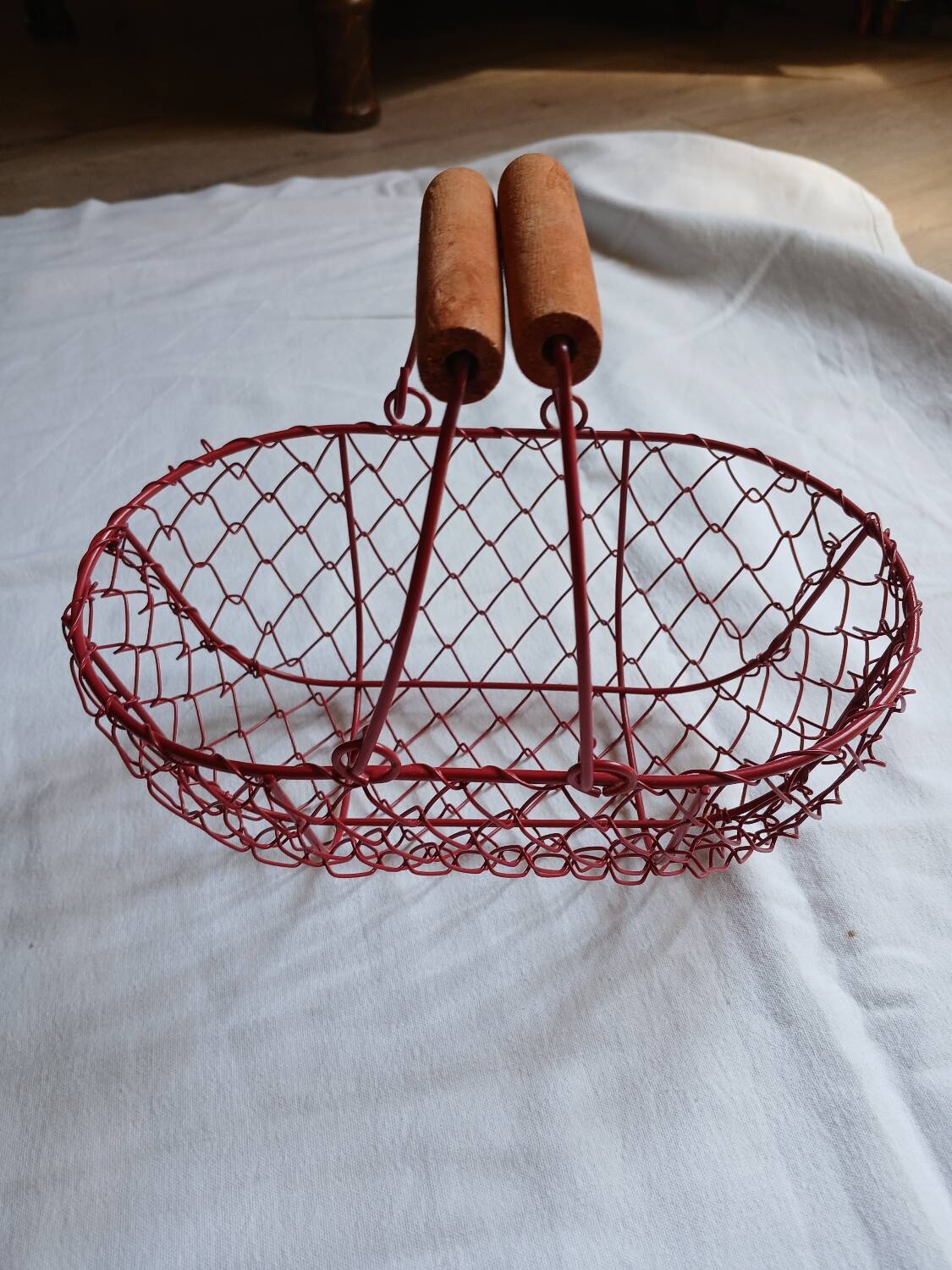 Small red metal basket