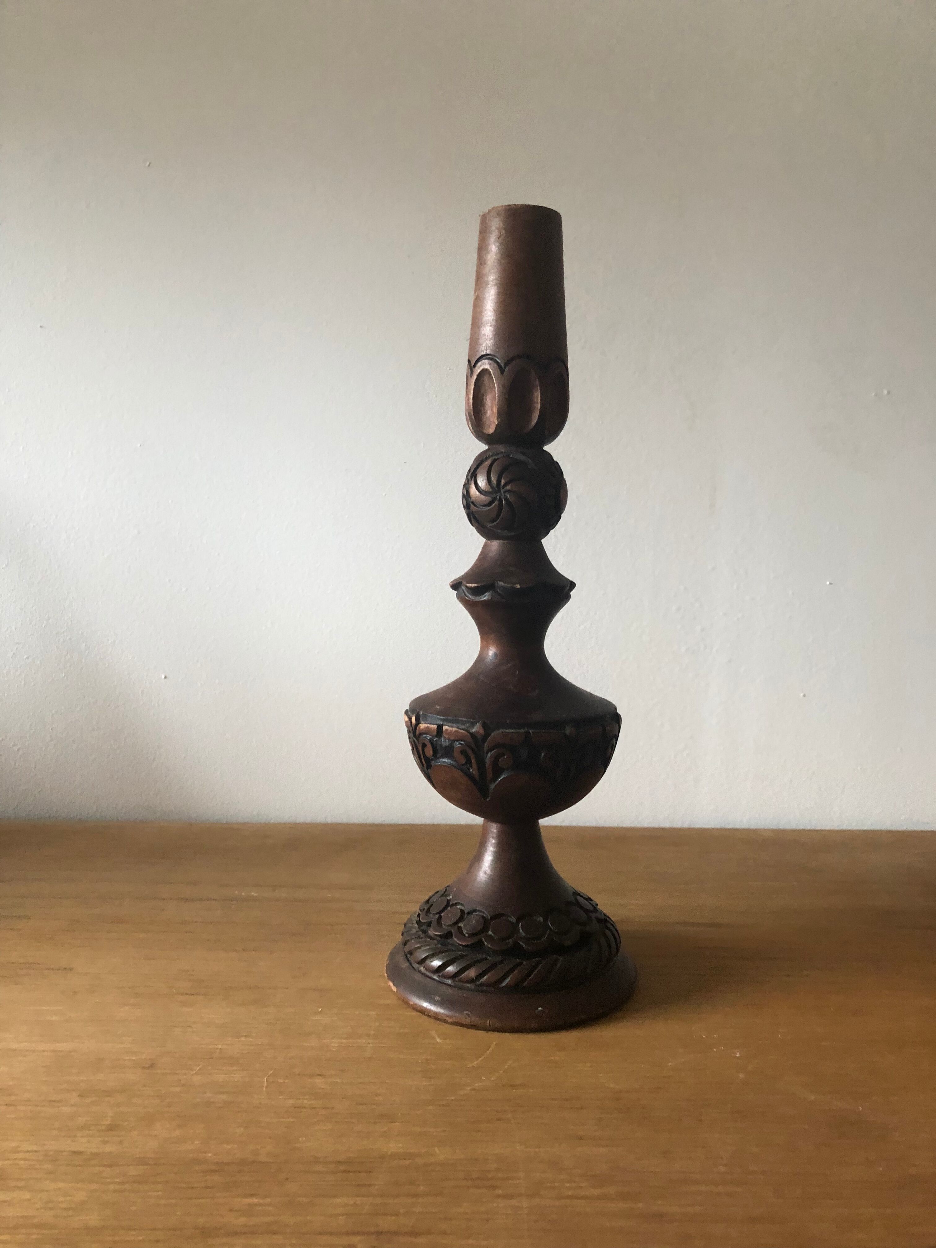 Carved wooden candle holder