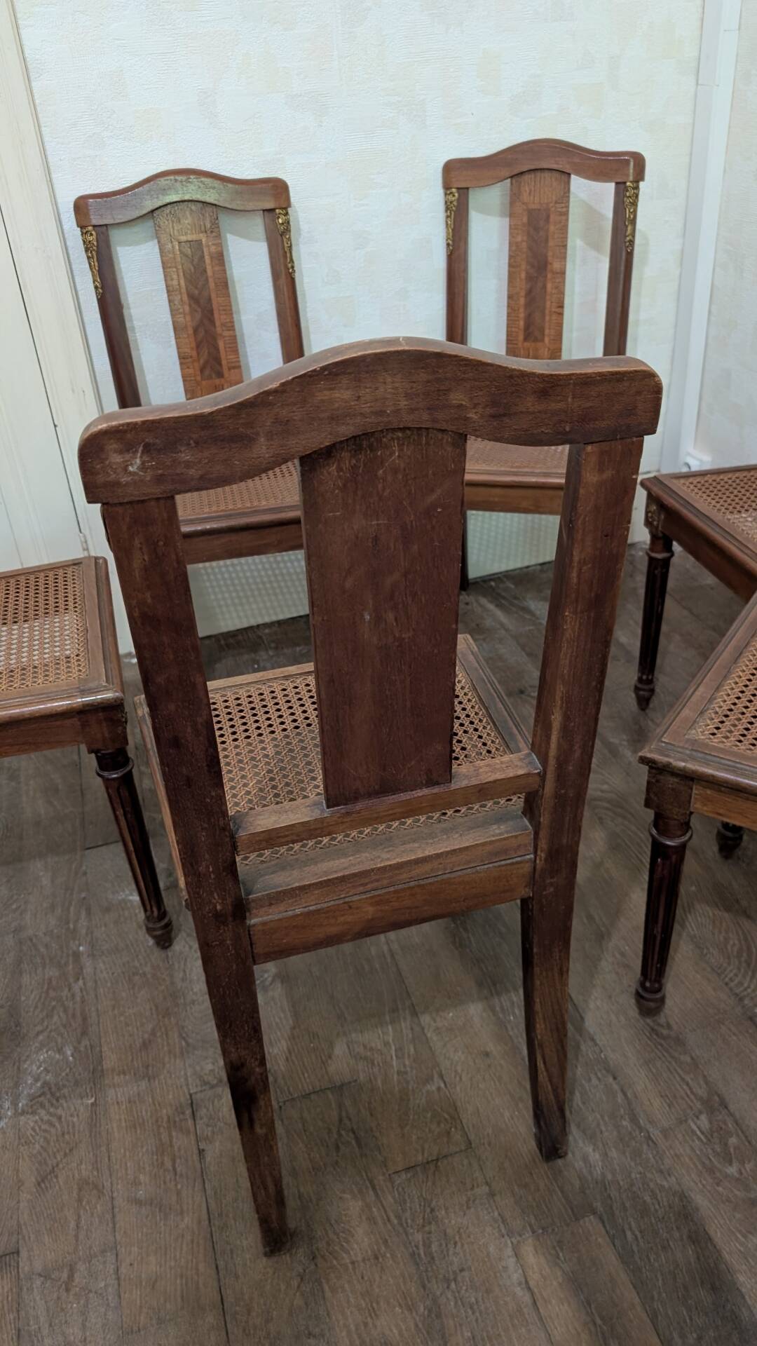 Set of 6 Louis XVI chairs in marquetry wood and caning.