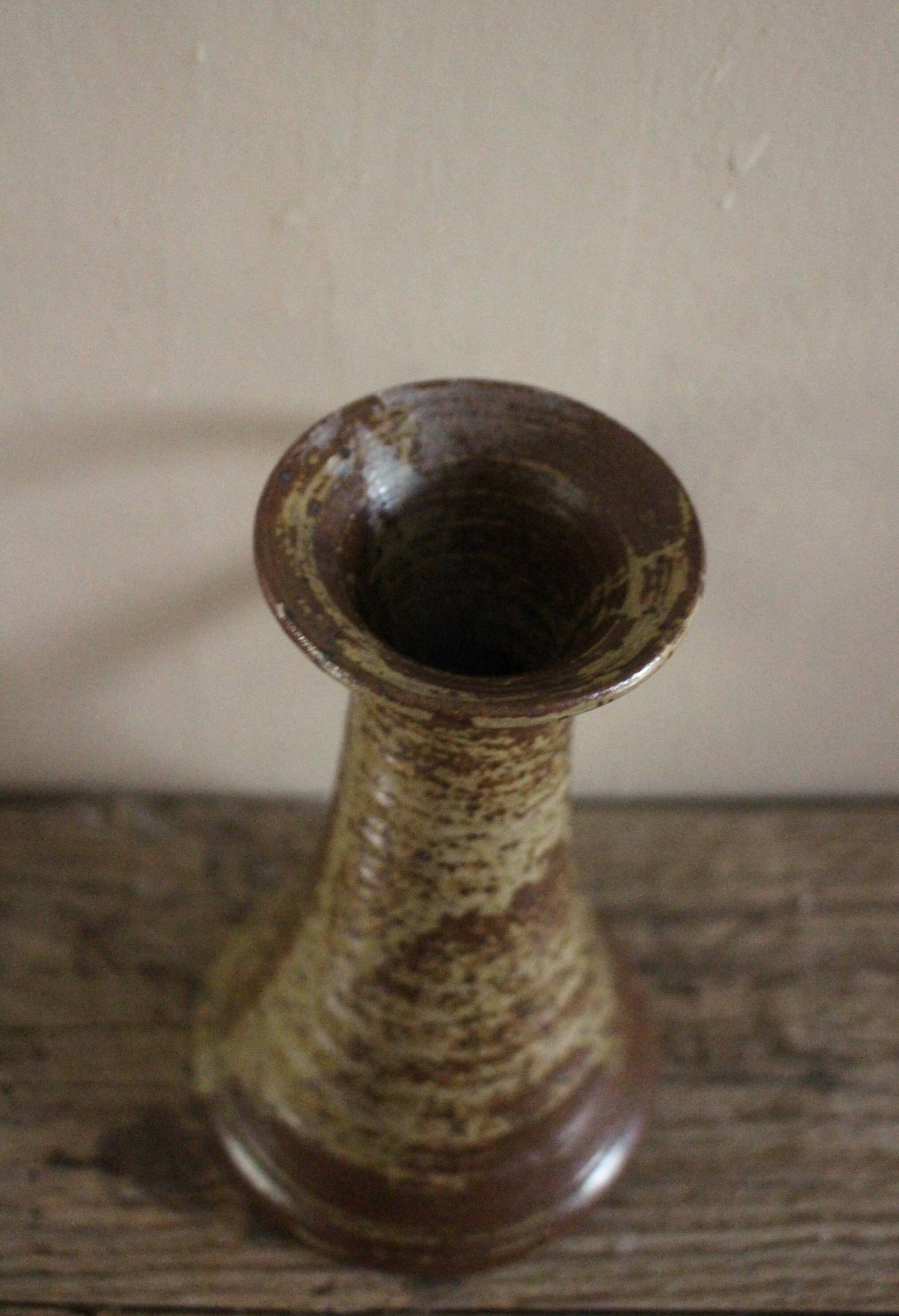 Vintage pyrite-glazed stoneware candlestick with handle