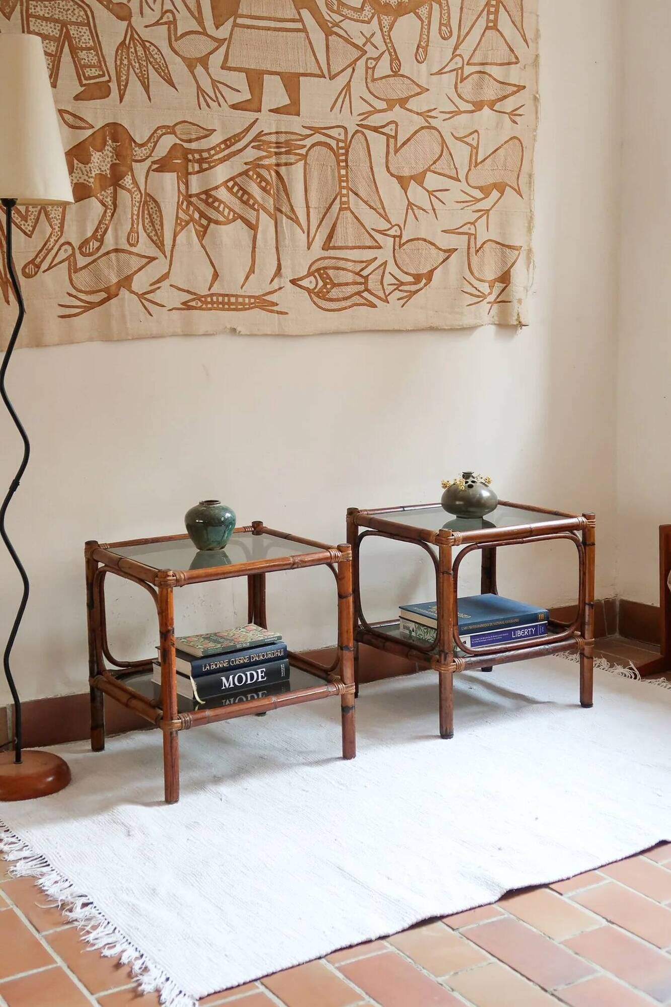 Pair of bamboo and rattan bedside tables, smoked glass tops.