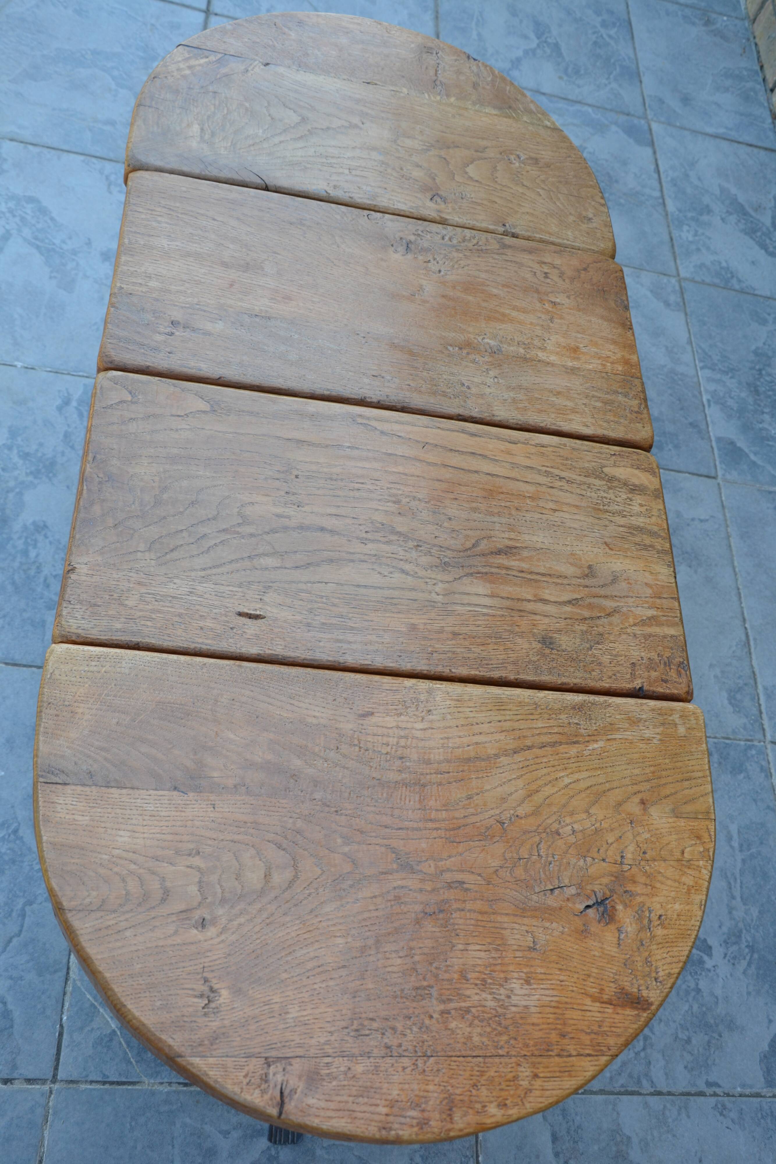 Unusual modular coffee table in oak and wrought iron.