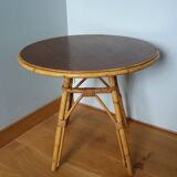 Round coffee table in wicker and bamboo