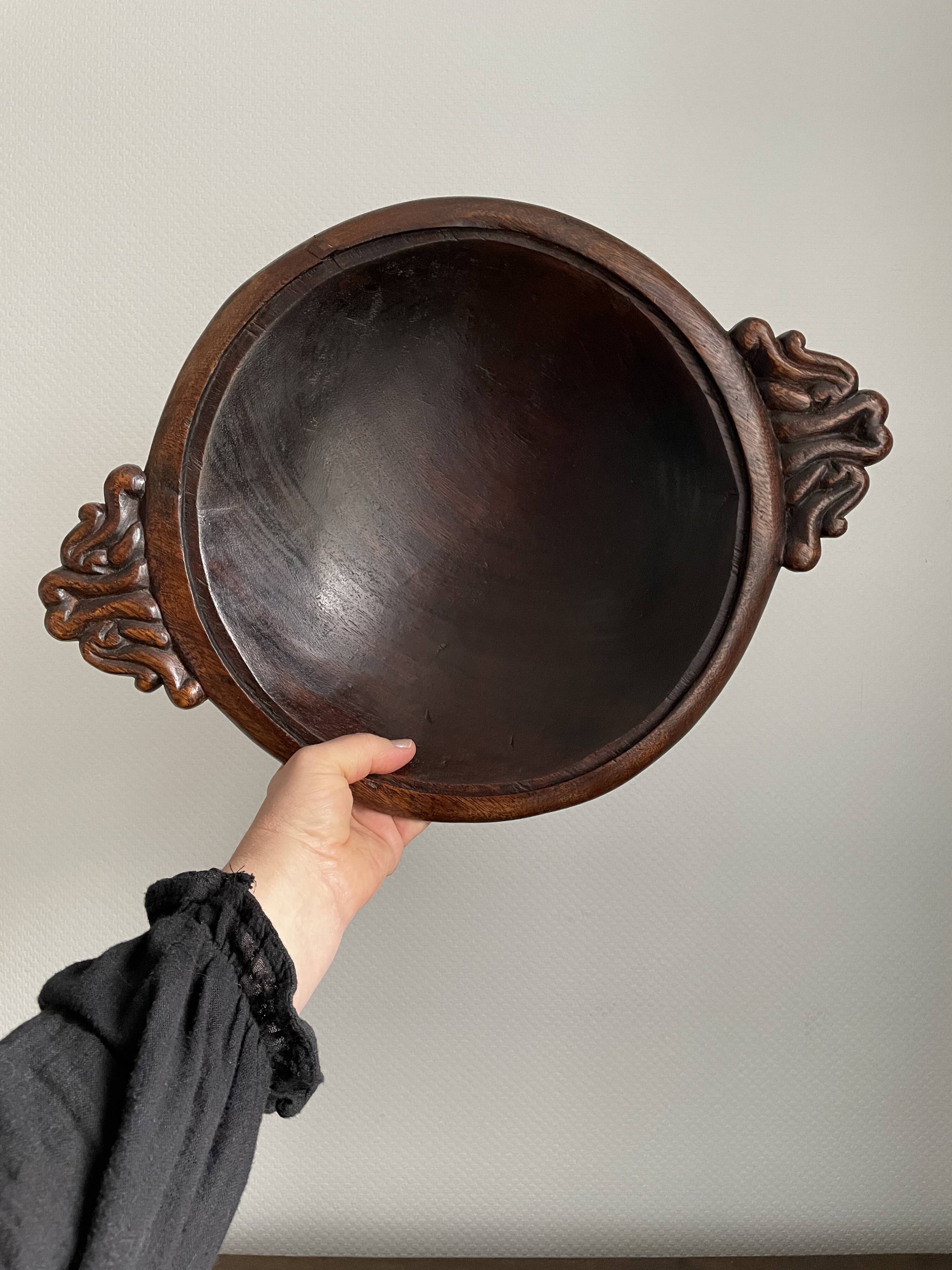 Hollow carved wooden dish