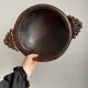 Plat creux en bois sculpté