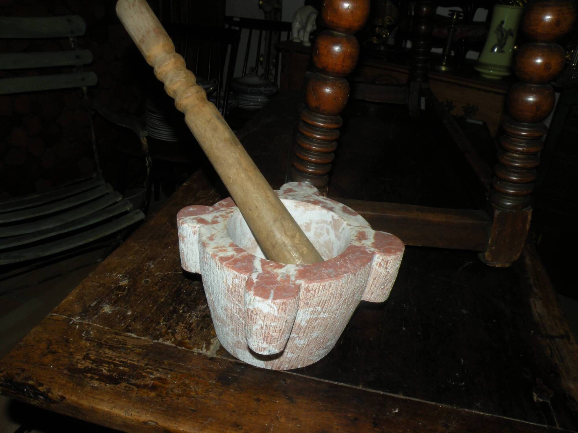 Mortar in veined red marble and its wooden pestle 20th century