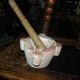 Mortar in veined red marble and its wooden pestle 20th century