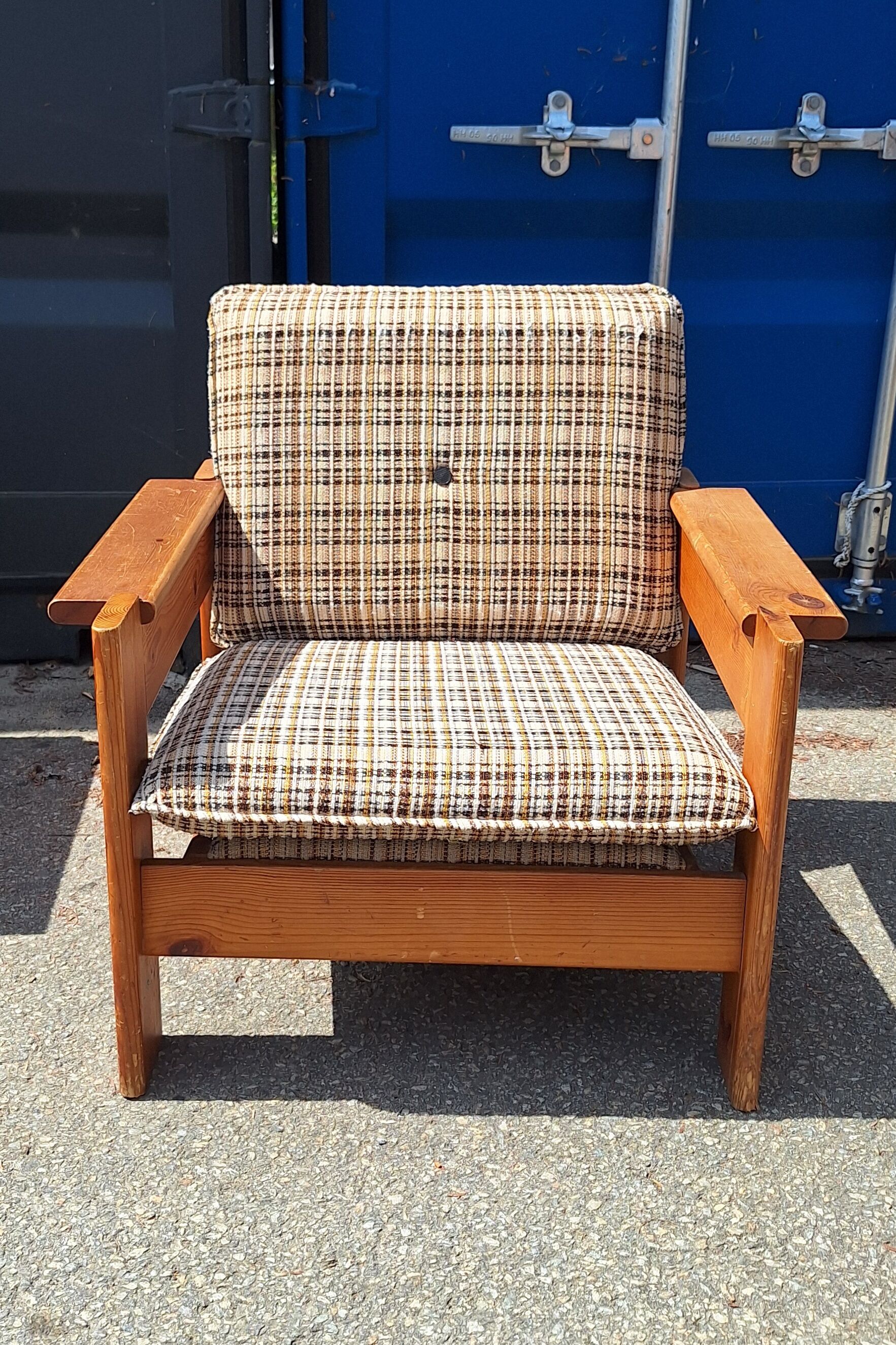 Brutalist-style bench and armchairs in 1970s pine.