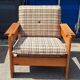 Brutalist-style bench and armchairs in 1970s pine.