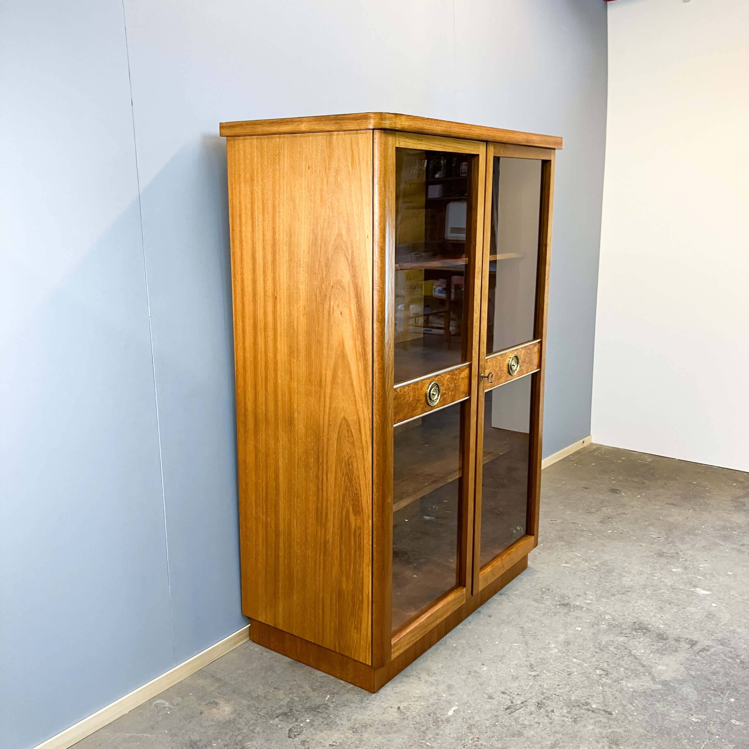 Art Deco cabinet with glass doors, various woods, 1930s
