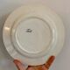 Set of 6 mismatched old iron earth flat plates