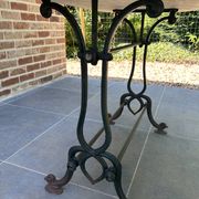 Art Nouveau cast iron and marble bistro table.