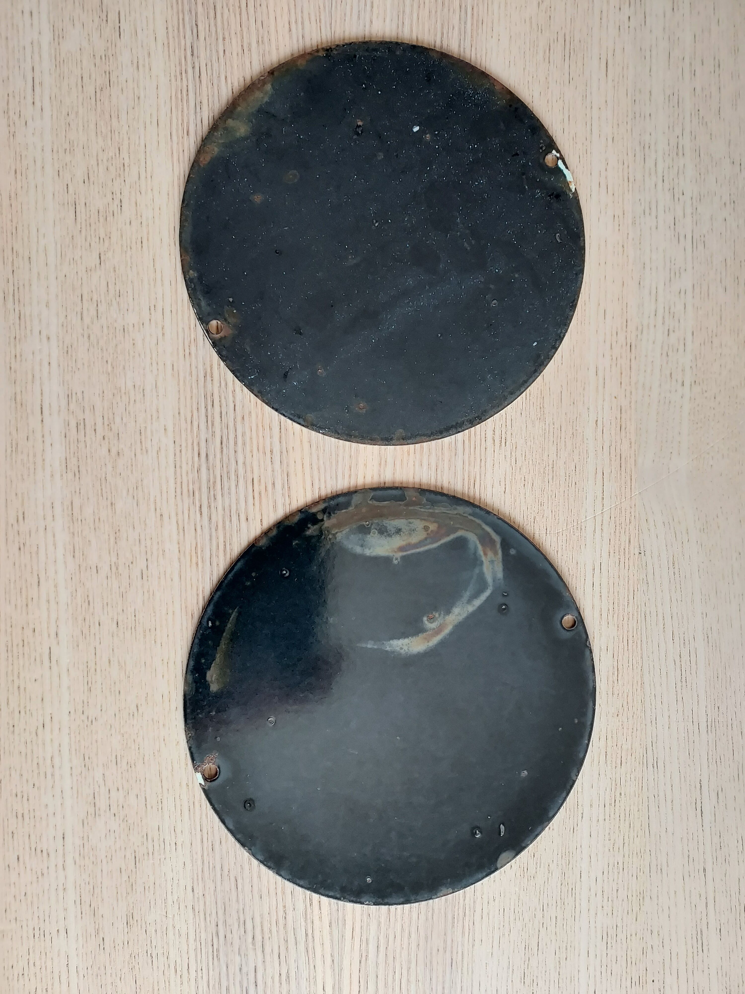 Enamelled city bus plates